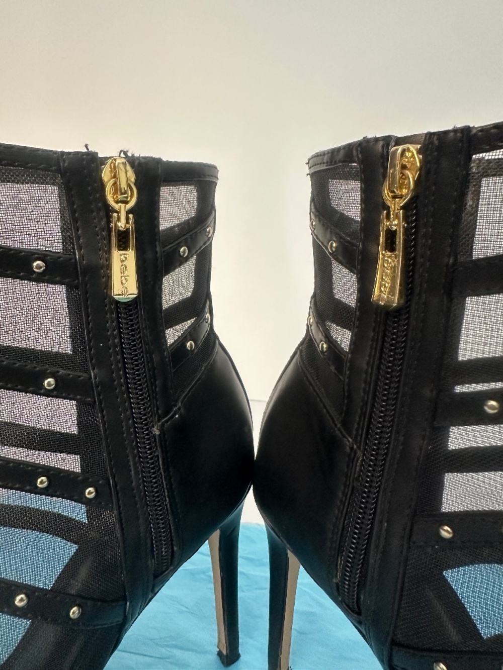 Bebe Black mesh ankle boots with gold studs and zipper closure Size 6